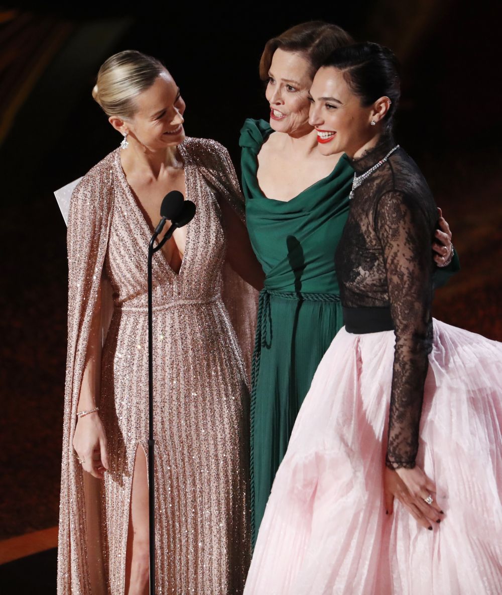 Brie Larson, Sigourney Weaver and Gal Gadot present the Best Original Score nominations performance by Eimear Noone, the first woman to conduct the orchestra at an Oscars ceremony, at the 92nd Academy Awards in Hollywood, Los Angeles, California, U.S., February 9, 2020. REUTERS/Mario Anzuoni
