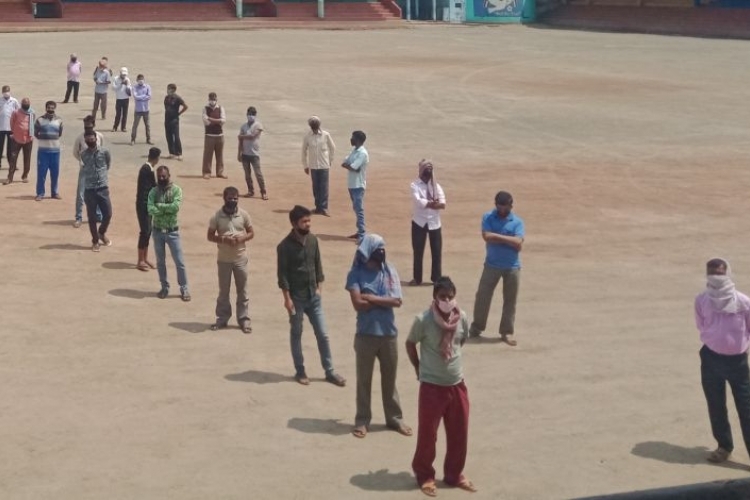 Newspaper hawkers in queue to receive relief items 