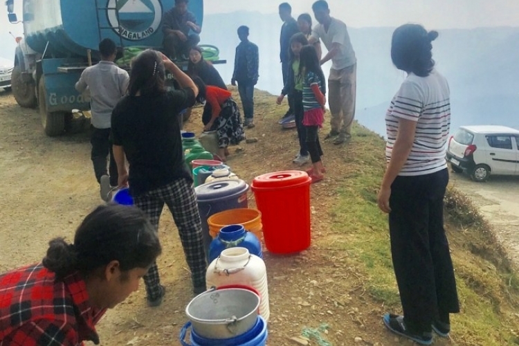 Zunheboto Police together with the PHED providing free water service