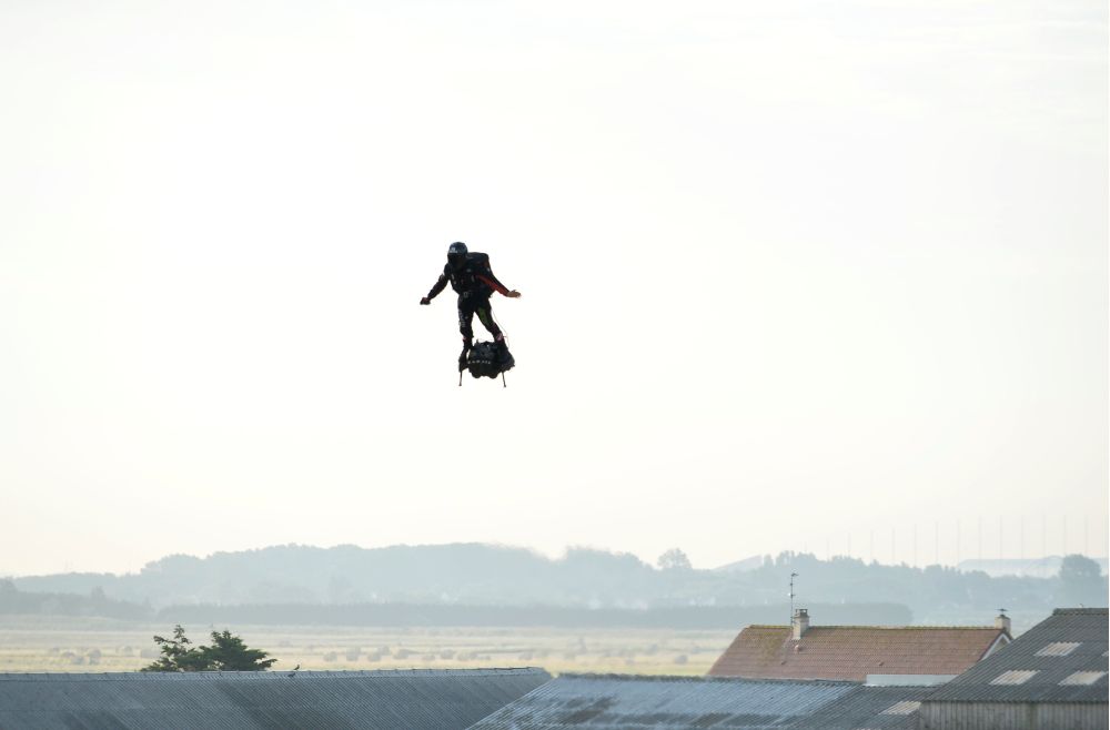 French inventor Franky Zapata takes off on a Flyboard for a second attempt to cross the English channel from Sangatte to Dover, in Sangatte, France, August 4, 2019.  REUTERS/Johanna Geron