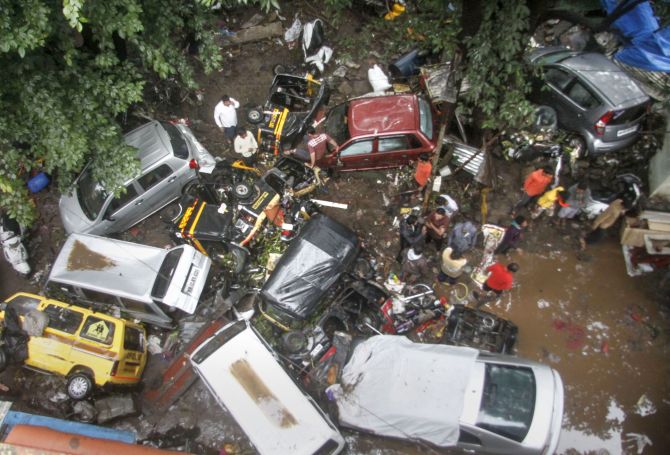 Pune: Vehicles are piled up on a street after a flash flood following heavy rains, in Pune, Thursday, Sept. 26, 2019. (PTI Photo)