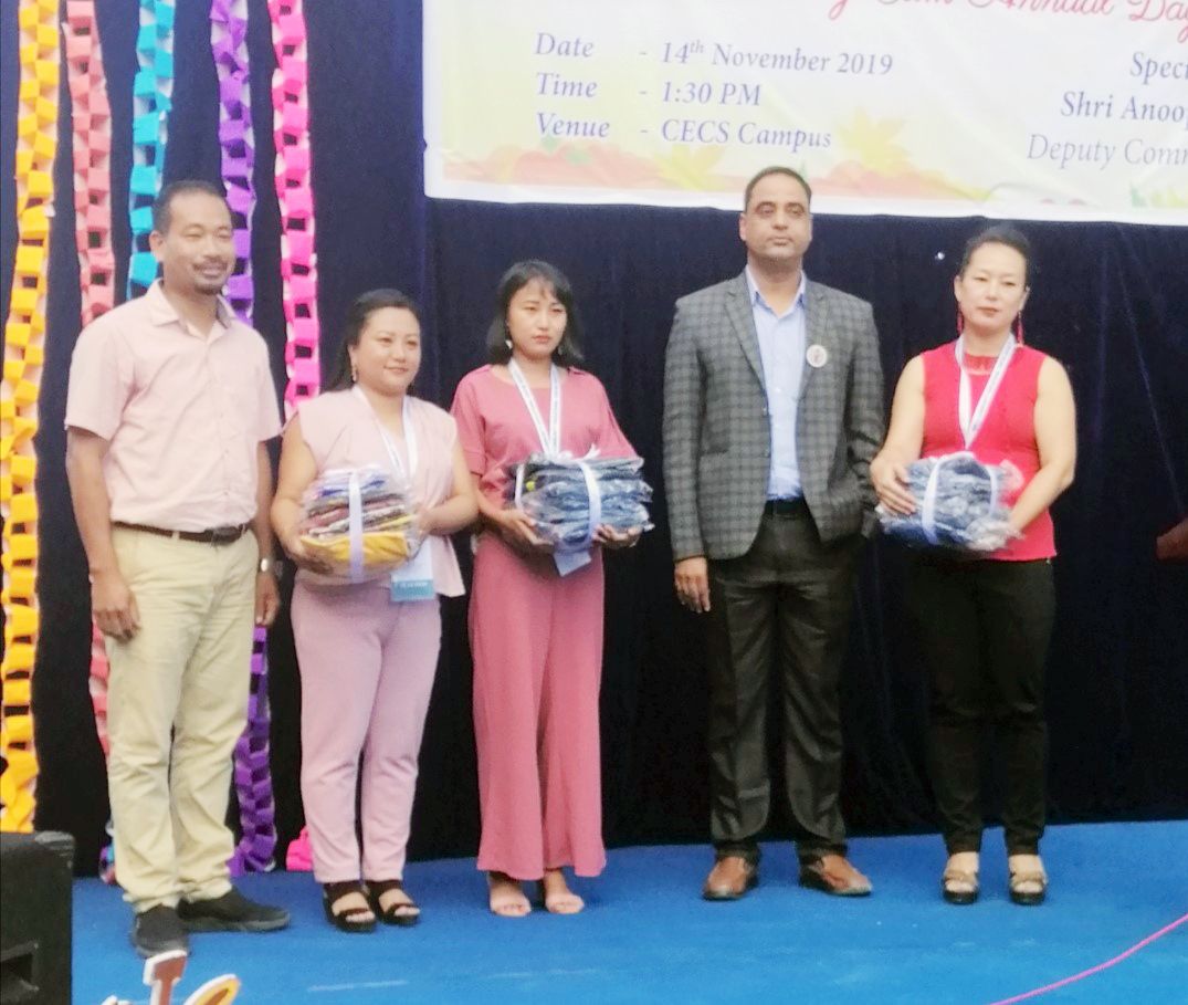 Anoop Khinchi IAS, DC Dimapur and Subonenba Longkumer, Director Community Education Centre School, Dimapur handing clothing materials to the teachers of CEC School on behalf of all the students received from “Sone Ki Chidiya Foundation” Mumbai who donated clothes for children through CECS on November 14. CECS, a project of Community Educational Centre Society (CECS) supported by The Hans Foundation celebrated Children’s day cum Annual day with Anoop Khinchi, IAS DC Dimapur as the special guest. The programme included special presentation, songs and dances each from classes A to 10. (Photo Courtesy: CECS Dimapur)