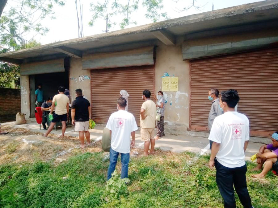 Red Cross volunteers overseeing maintenance of social distancing at United North Block B, Dimapur. (DIPR Photo)