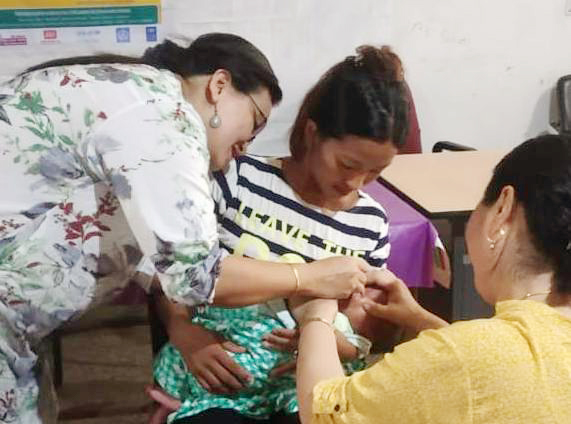 Dr. Antoly Suu, Dy Chief Medical Officer, Dimapur administers the first five-drops of Oral Rotavirus Vaccine during the launching of Oral Rotavirus Vaccine as part of Routine Immunization Schedule under Universal Immunization Programme in the District on August 2. During the brief launching programme, Dr. Antoly Suu, stated that rotavirus diarrhoea is one of the leading causes of death among children below five years. Rotavirus vaccine (RVV) will protect a child from diarrhoea caused by rotavirus. She further informed that Rotavirus vaccine will now be included in the Routine Immunization Schedule of the District and beneficiaries can avail this vaccine free of cost from all government health units. (Photo Courtesy: CMO office Dimapur) 