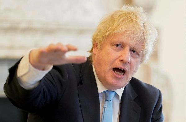 Britain's Prime Minister Boris Johnson appears before the Liaison Committee via Zoom from the cabinet room at 10 Downing Street, amid the coronavirus disease (COVID-19) outbreak, in London, Britain on May 27, 2020. (REUTERS Photo)