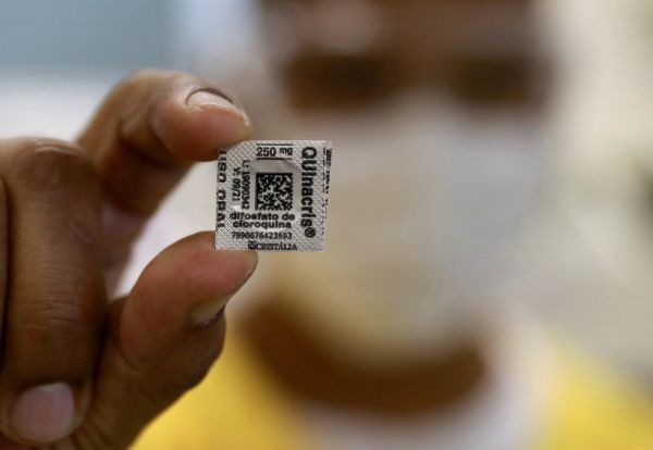 A nurse shows a Hydroxychloroquine pill, amid the coronavirus disease (COVID-19) outbreak, at Nossa Senhora da Conceicao hospital in Porto Alegre, Brazil on April 23, 2020. (REUTERS File Photo)