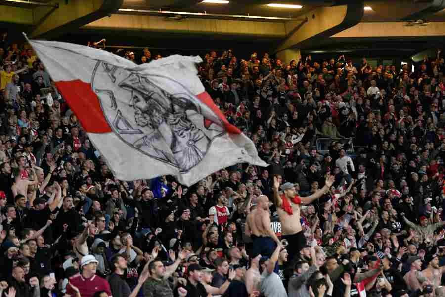 Ajax fans wave a flag during the match. (Reuters File Photo)