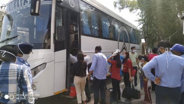 Stranded citizens are seen boarding their buses as they embark on a 3-day journey from Punjab to Nagaland on May 26. (Photo Courtesy: @abumetha/Twitter)