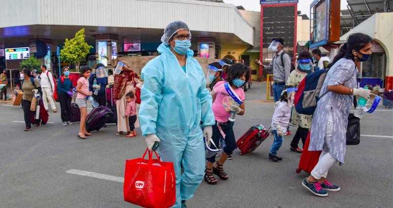 Passengers, arriving from New Delhi, leave the Jai Prakash Narayan International Airport, during ongoing COVID-19, lockdown, in Patna, Friday, May 29, 2020. Photo: PTI