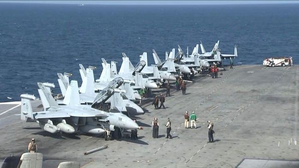 his photo taken from Yonhap News TV on Oct. 17, 2017, shows fighters preparing to take off from the USS Ronald Reagan aircraft carrier participating in the ongoing South Korea-U.S. joint naval drills in the East Sea. (IANS File Photo)) .
