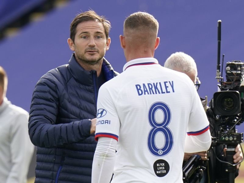 Chelsea manager Frank Lampard with Ross Barkley after the match, as play resumes behind closed doors following the outbreak of the coronavirus disease (COVID-19) Tim Keeton/Pool via REUTERS