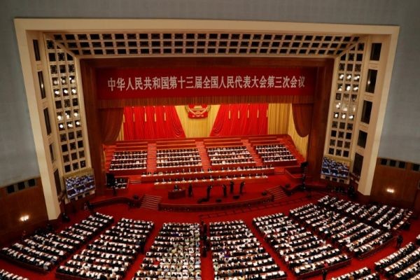 Chinese officials and delegates attend the opening session of the National People's Congress (NPC) at the Great Hall of the People in Beijing, China on May 22, 2020. (REUTERS File Photo)