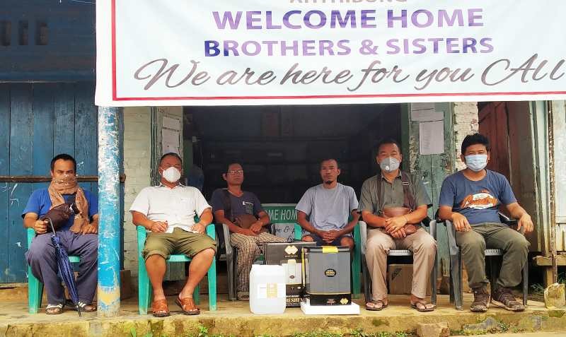 Nagaland SSA Teachers Association (NSSATA) Peren Unit donated a touch free hand sanitizer dispenser (11 litres) towards the quarantine facility in Ahthibung. NSSATA Peren Unit members gave away the dispenser to the Manager of the Quarantine Facility, Tonga Hangsing at the Help Desk of the Management on June 26. (Photo Courtesy: Quarantine Facility Centre Ahthibung)