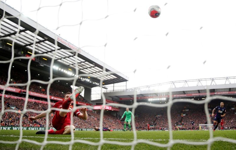 Liverpool's James Milner clears the ball off the line after a shot from Bournemouth's Ryan Fraser Action Images via Reuters/Carl Recine