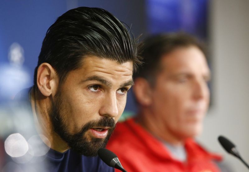 Sevilla's player Nolito (L) and coach Eduardo Berizzo attend a news conference ahead of the match against Spartak Moscow. REUTERS/Sergei Karpukhin/File Photo