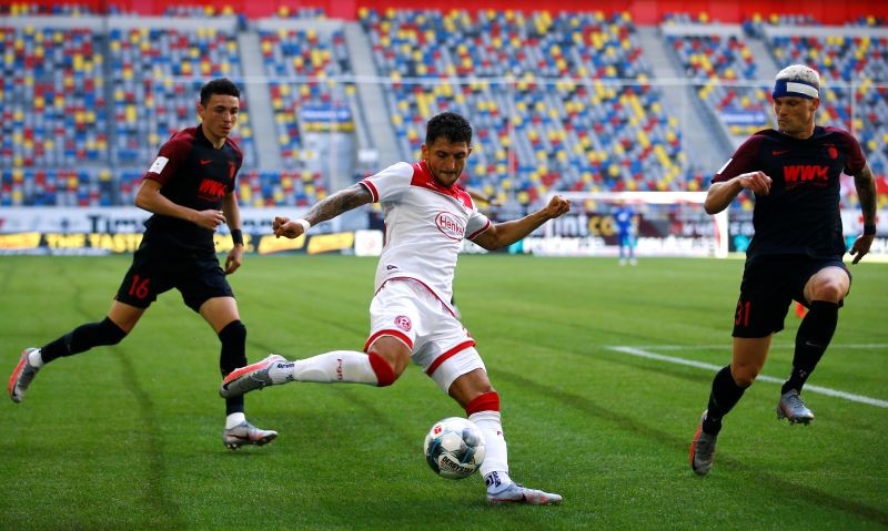 Soccer Football - Bundesliga - Fortuna Dusseldorf v FC Augsburg - Merkur Spiel-Arena, Dusseldorf, Germany - June 20, 2020 Fortuna Dusseldorf's Matthias Zimmermann in action, following the resumption of play behind closed doors after the outbreak of the coronavirus disease (COVID-19) REUTERS/Leon Kuegeler/Pool