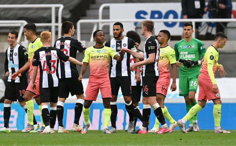 Manchester City's Raheem Sterling with Newcastle United's Sean Longstaff after the match, as play resumes behind closed doors following the outbreak of the coronavirus disease (COVID-19) Shaun Botterill/Pool via REUTERS