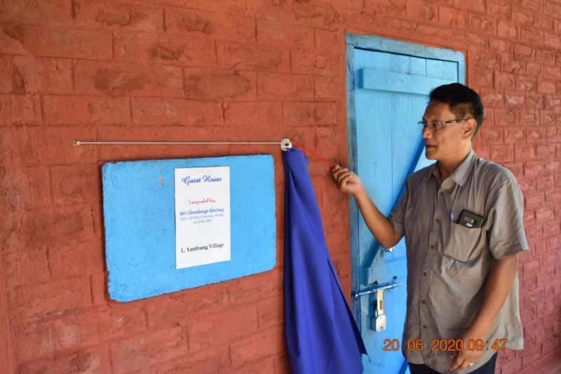BDO Wozhuro, Chumthungo Khuvung unveils the monolith of L Yanthung village guest house on June 20. (DIPR Photo)