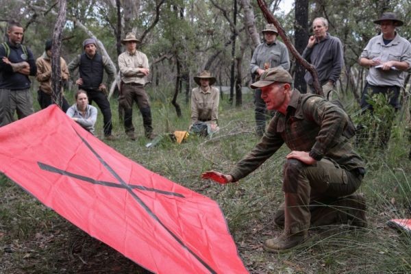 Wilderness survival instructor Gordon Dedman teaches students about signalling for rescue during a basic skills course, which has seen an increase in demand since the coronavirus disease (COVID-19) outbreak, in the Ingleside suburb of northern Sydney, Australia on May 31, 2020. (REUTERS File Photo)