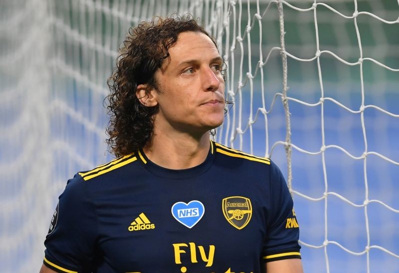 Arsenal's David Luiz reacts after he is sent off after conceding a penalty as play resumes behind closed doors following the outbreak of the coronavirus disease (COVID-19) Laurence Griffiths/Pool via REUTERS