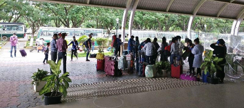 A total of 250 people reached Dimapur by flight on June 24. Out of 250, Air India bought 102 from Kolkata and seven from Guwahati while Indigo flight bought 141 from Kolkata. A report from the DPRO office Dimapur stated that “after the medical screening and mandatory procedures were done, all the returnees were transported by buses to their respective quarantine centers.” (DIPR Photo)