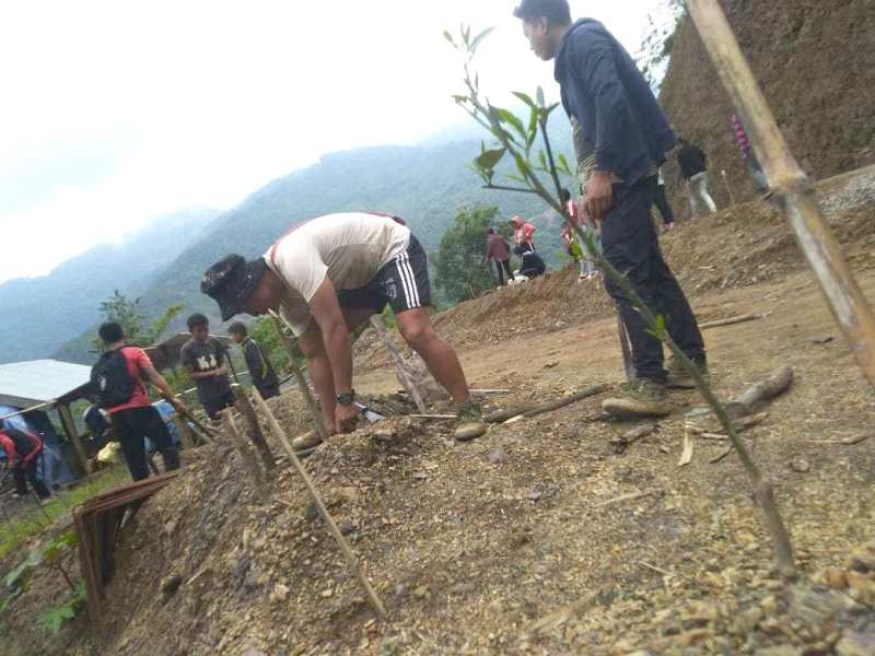 Upper Khomi Students Union (UKSU) undertake tree plantation along the ongoing construction of two lane road to mark World Environment Day on June 5.