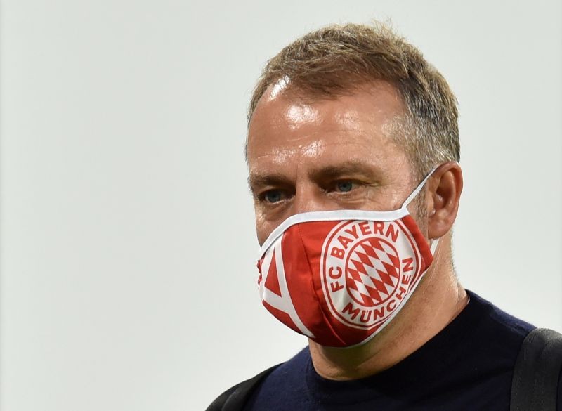 Bayern Munich coach Hansi Flick wearing a protective face mask after the match, as play resumes behind closed doors following the outbreak of the coronavirus disease (COVID-19) Christof Stache/Pool via REUTERS