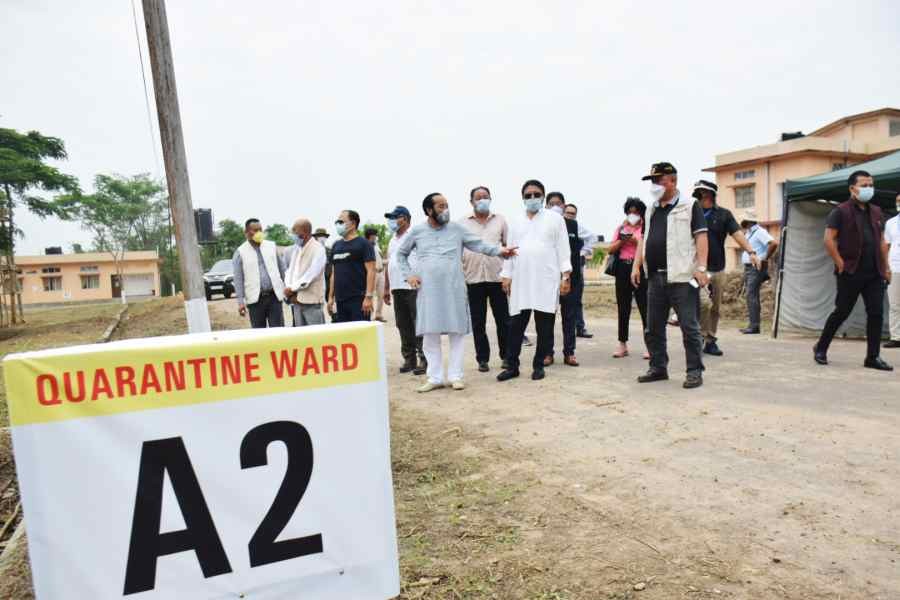 Y Patton along with his entourage guided by DGP Nagaland inspecting the Ganeshnagar quarantine center on June 4. (DIPR Photo)