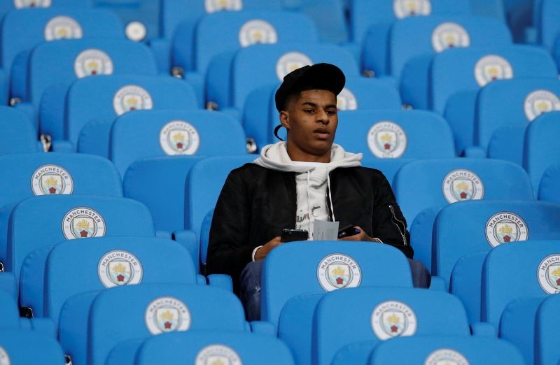 FILE PHOTO: Soccer Football - Carabao Cup - Semi Final Second Leg - Manchester City v Manchester United - Etihad Stadium, Manchester, Britain - January 29, 2020 Manchester United's Marcus Rashford in the stands before the match REUTERS/Phil Noble/File photo