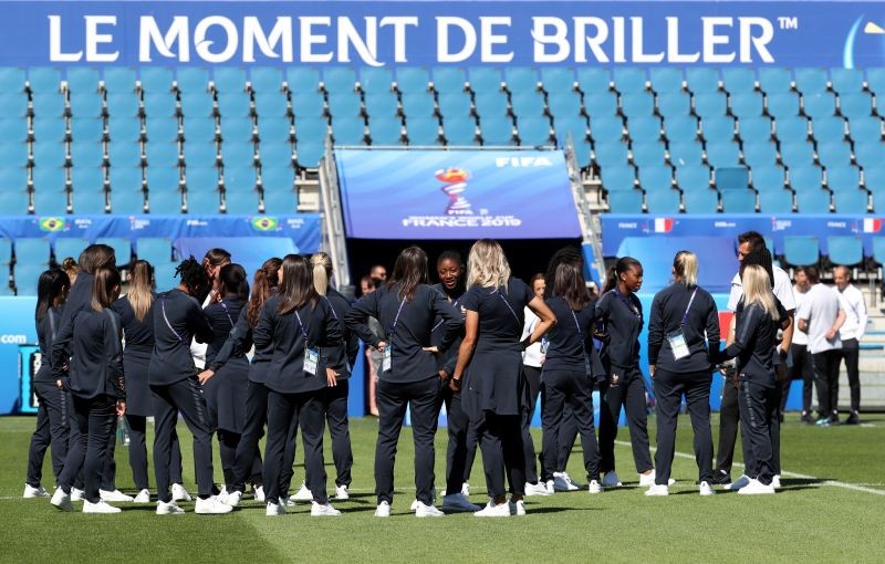 France players walk on the pitch REUTERS/Yves Herman/Files