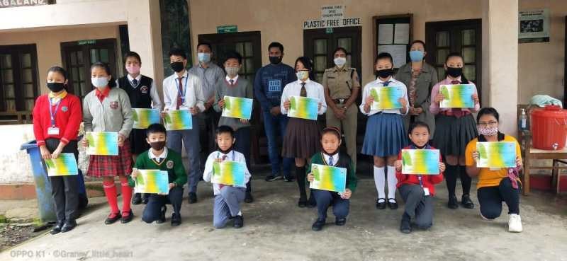 Officials along with the students who won the online painting and essay competition during the occasion of World Environment Day in Tuensang on June 5. (DIPR Photo)