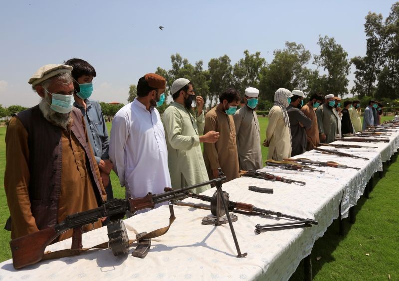 Members of the Taliban handover their weapons and join in the Afghan government's reconciliation and reintegration program in Jalalabad, Afghanistan on June 25, 2020. (REUTERS File Photo)