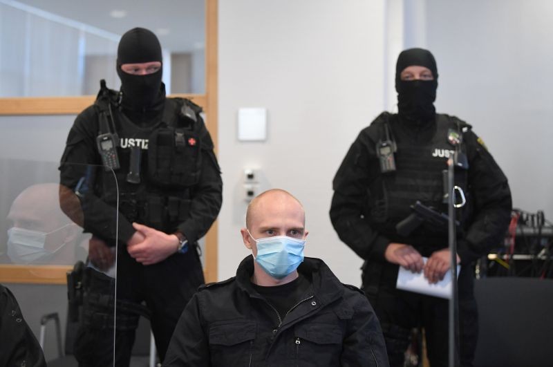 Stephan B., accused of shooting two people after an attempt to storm a synagogue in Halle, arrives for the start of his trial at a local court in Magdeburg, Germany on July 21, 2020. (REUTERS Photo)