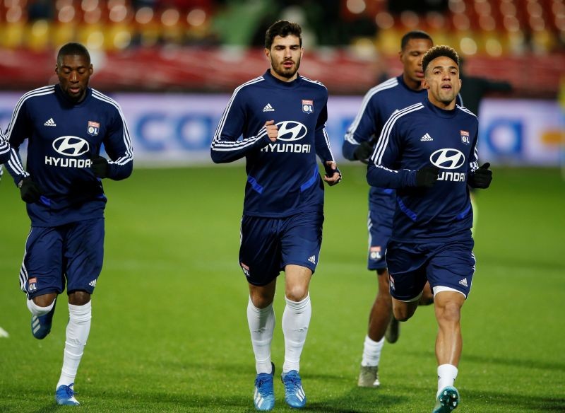 Olympique Lyonnais' Martin Terrier with teammates during the warm up before the match REUTERS/Pascal Rossignol