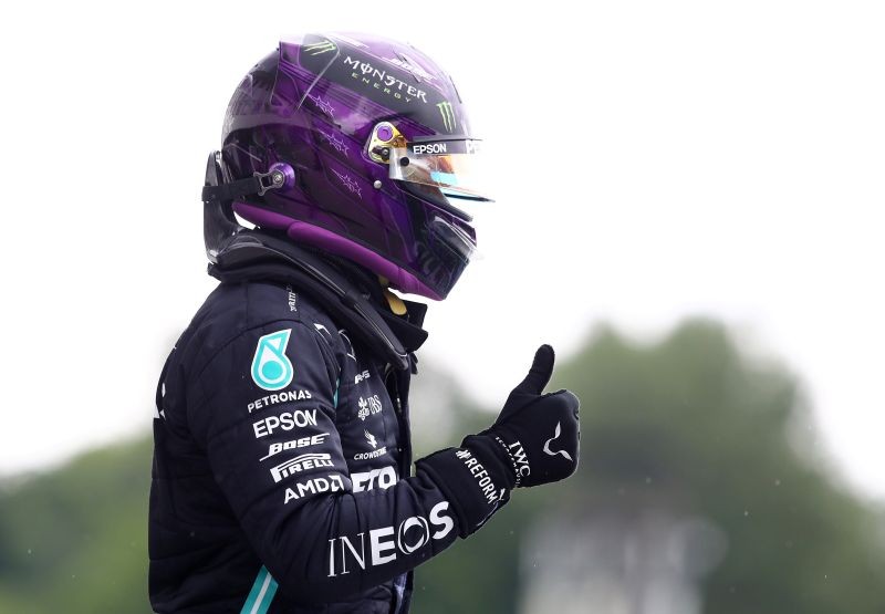 Formula One F1 - Hungarian Grand Prix - Hungaroring, Budapest, Hungary - July 18, 2020 Mercedes' Lewis Hamilton celebrates after qualifying in pole position Mark Thompson/Pool via REUTERS