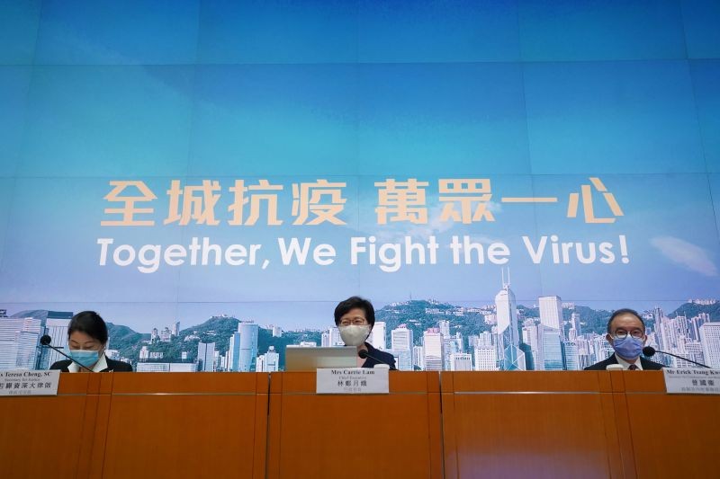 Hong Kong Chief Executive Carrie Lam, Secretary for Justice of Hong Kong Teresa Cheng and Secretary for Constitutional and Mainland Affairs Erick Tsang Kwok-wai, all wearing face masks following the coronavirus disease (COVID-19) outbreak, attend a news conference in Hong Kong, China on July 31. (REUTERS Photo)