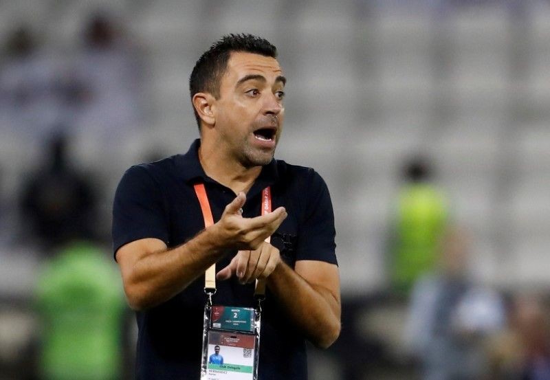 FILE PHOTO: Soccer Football - Club World Cup - Quarter Final - Monterrey v Al Sadd SC - Jassim Bin Hamad Stadium, Doha, Qatar - December 14, 2019 Al-Sadd coach Xavi reacts REUTERS/Kai Pfaffenbach/File Photo