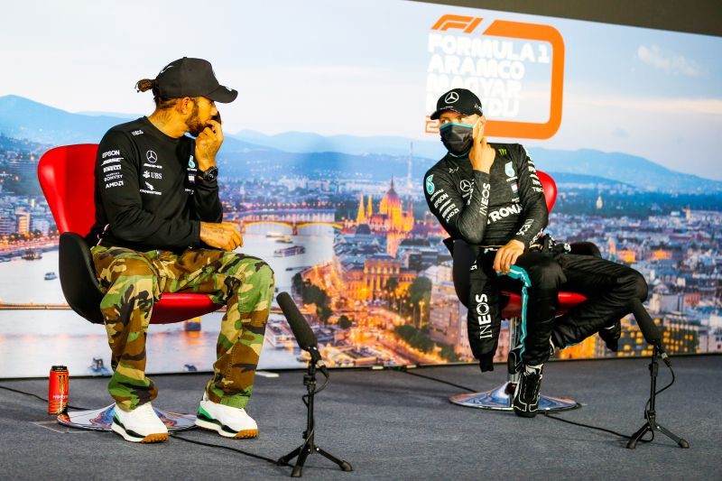 Race winner Mercedes' Lewis Hamilton and third placed Mercedes' Valtteri Bottas during a press conference after the race FIA/Handout via REUTERS