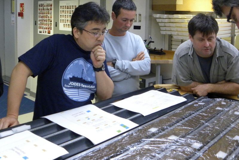 Researchers Yuki Morono, Laurent Toffin and Steven DÕHondt (L-R) work aboard the research drillship JOIDES Resolution with sediment cores gathered from deep beneath the seafloor under the Pacific Ocean in this undated photograph released on July 28, 2020. (REUTERS Photo)