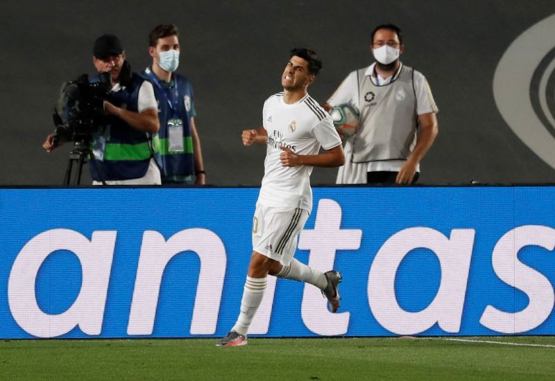 Real Madrid's Marco Asensio celebrates scoring their second goal, as play resumes behind closed doors following the outbreak of the coronavirus disease (COVID-19) REUTERS/Susana Vera