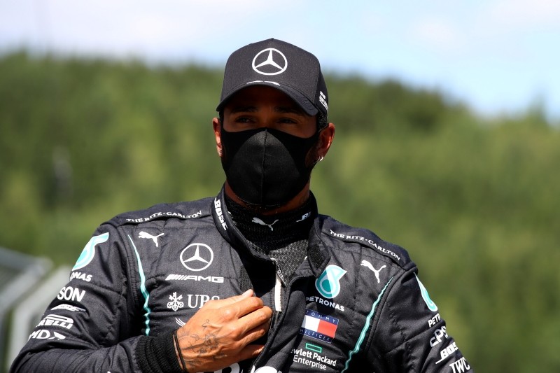 Mercedes' Lewis Hamilton wearing a protective face mask after qualifying, as F1 resumes following the outbreak of the coronavirus disease (COVID-19) Mark Thompson/Pool via REUTERS