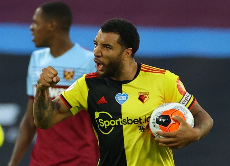 Watford's Troy Deeney celebrates scoring their first goal, as play resumes behind closed doors following the outbreak of the coronavirus disease (COVID-19) Pool via REUTERS/Richard Heathcote