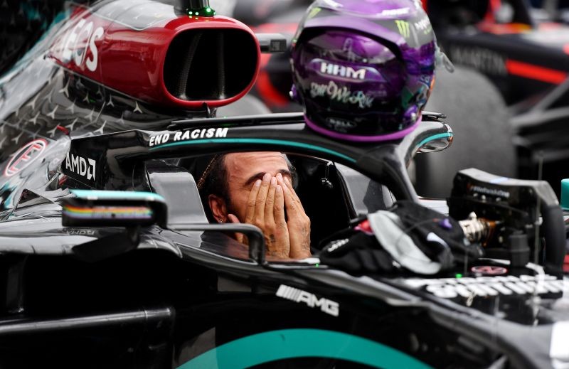 Mercedes' Lewis Hamilton celebrates winning the race Joe Klamar/Pool via REUTERS