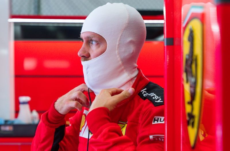 Ferrari's Sebastian Vettel in the pit lane, as F1 resumes behind closed doors following the outbreak of the coronavirus disease (COVID-19) FIA/Handout via REUTERS