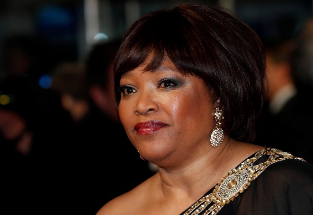 Zindzi Mandela, daughter of former South African president Nelson Mandela, arrives for the Royal premiere of "Mandela: Long Walk to Freedom" in London December 5, 2013. REUTERS/Suzanne Plunkett/File Photo