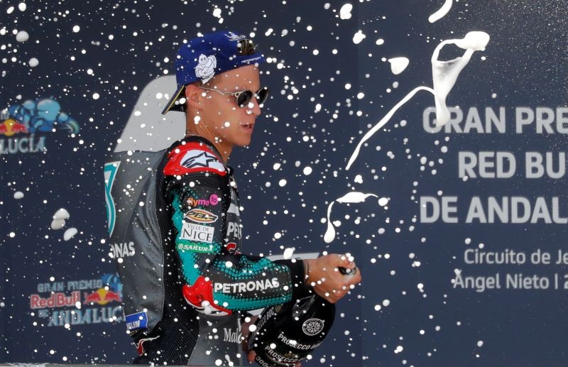 MotoGP - Andalucia Grand Prix - Circuito de Jerez, Jerez, Spain - July 26, 2020 Petronas Yamaha SRT's Fabio Quartararo celebrates on the podium after finishing first REUTERS/Jon Nazca