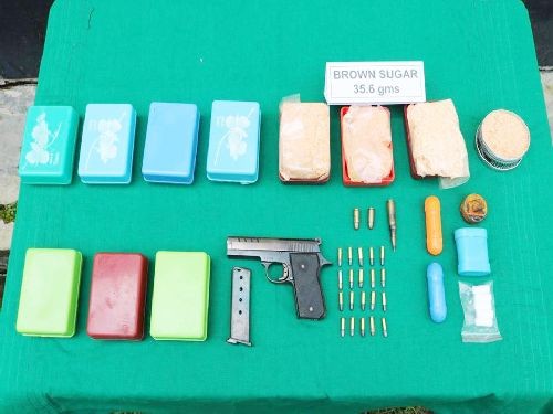 The seized contraband brown sugar and arms in Jotsoma, Kohima on July 17. (Photo Courtesy: PRO, HQ IGAR-N)