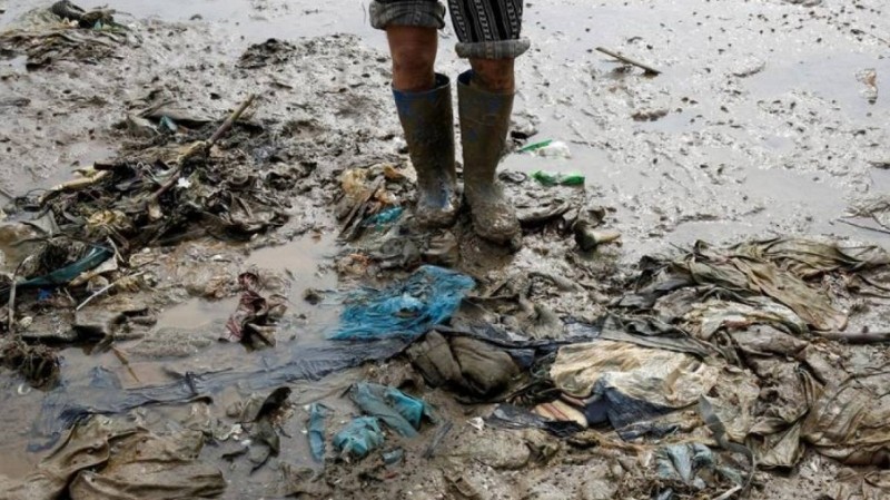 A person is seen at the beach covered with plastic waste in Thanh Hoa province, Vietnam June 4, 2018. (Reuters File Photo)
