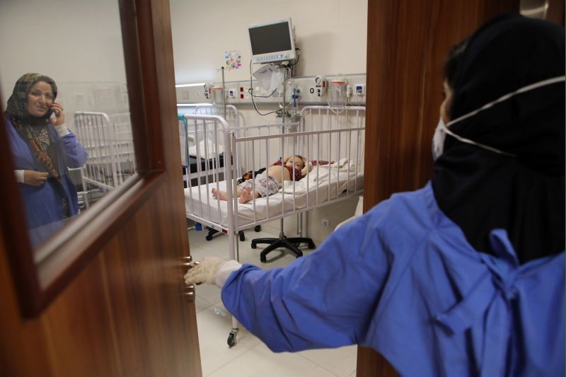 A child lies on a bed at Mofid children's hospital, where children suspected to be infected with the coronavirus disease (COVID-19) are treated, in Tehran, Iran on July 8, 2020 .(REUTERS File Photo)