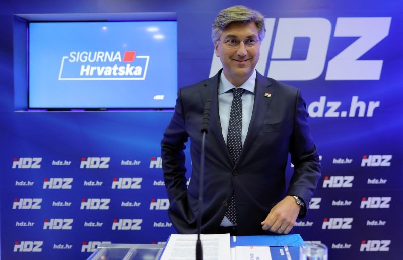 Croatian Prime Minister and leader of the Croatian Democratic Union (HDZ) Andrej Plenkovic reacts as he talks to the media at party headquarters, ahead of parliamentary elections, in downtown Zagreb, Croatia on July 3. (REUTERS Photo)